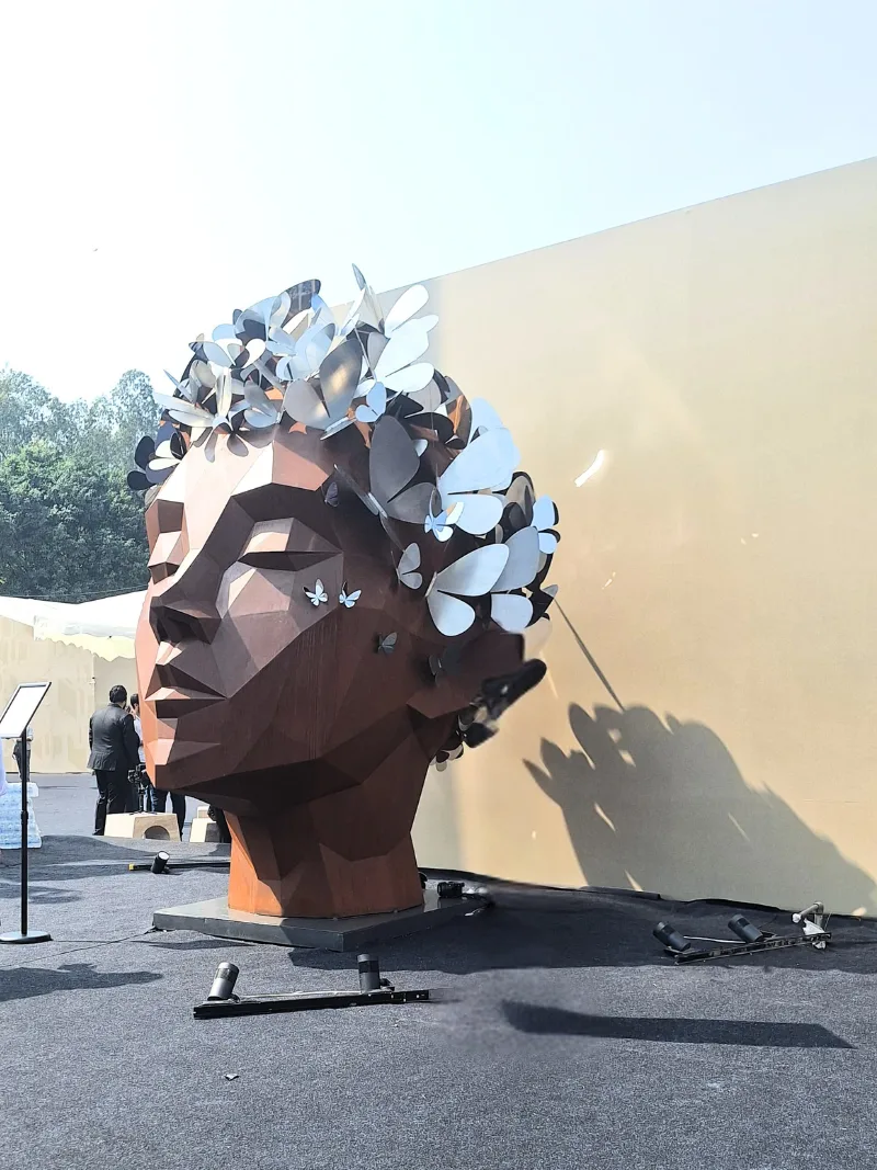 Butterfly human head sculpture art project, India