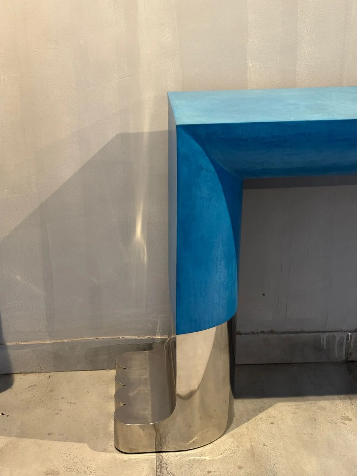 Parametric table — computationally designed metal base with glass or stone top by FormForge India